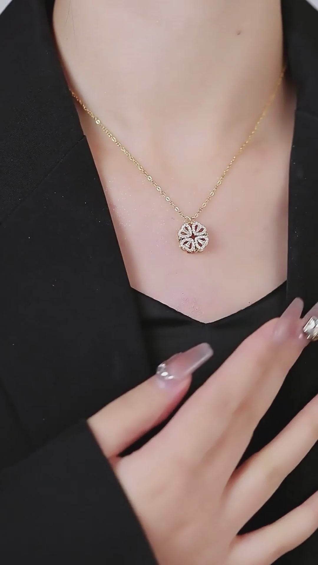 Load video: Retro Magnetic Folding Heart Shaped Four Leaf Clover Pendant Necklace Women Love Clavicle Chain Gifts Openable Choker Jewelry