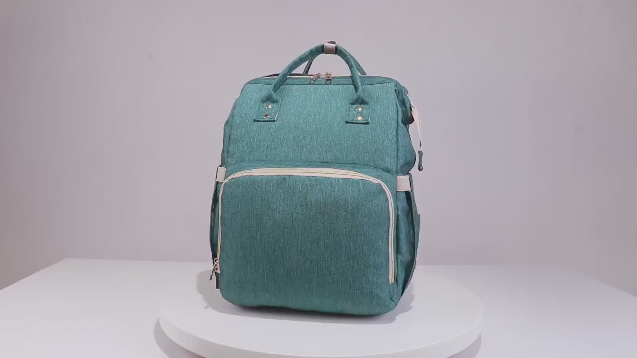 Load video: USB Charging Version Mommy Bed Backpack Folding Large Capacity Multi-function